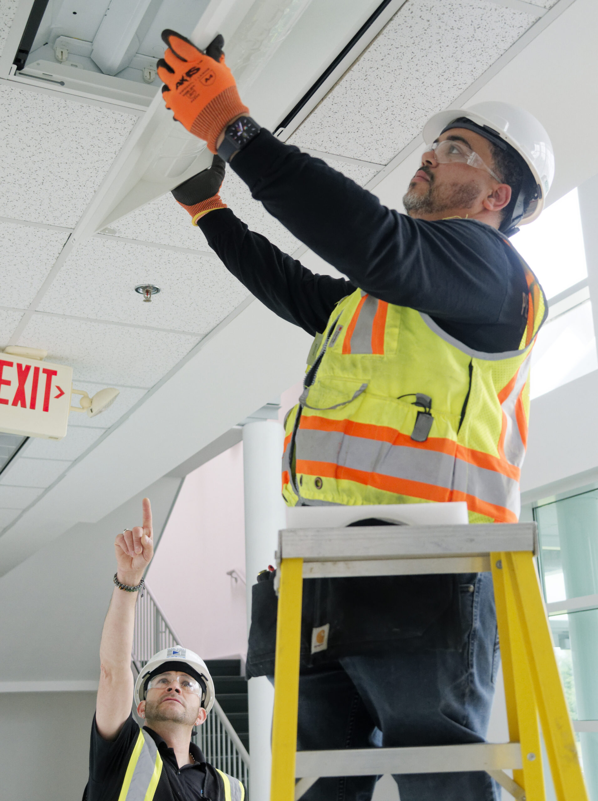 Lighting Systems Efficiency 1 Man installing LED lighting
